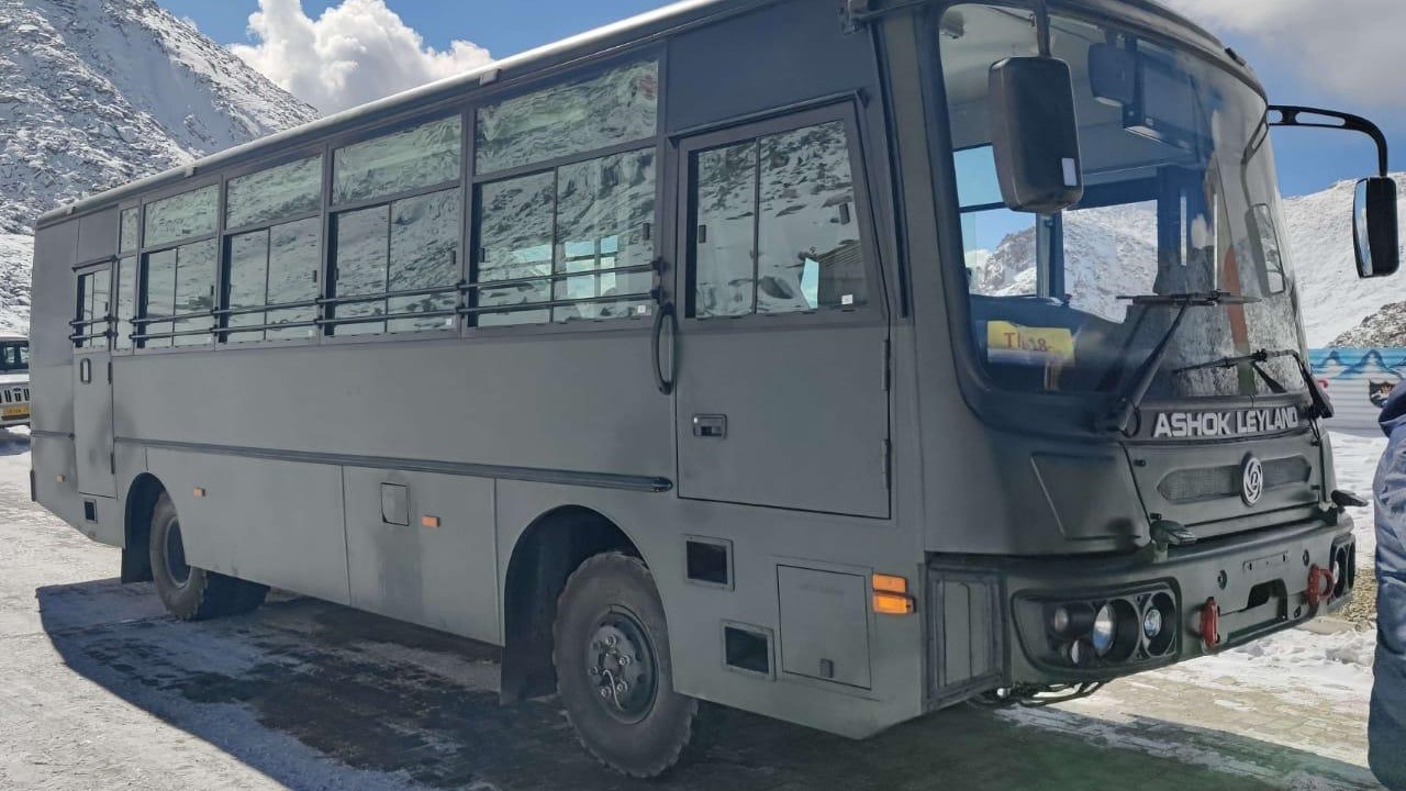 An Ashok Leyland bus supplied to the Indian Army, and the contract signing moment with Army officials.
