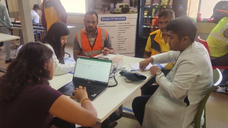 Amazon India delivery associates being screened for health conditions at a camp.
