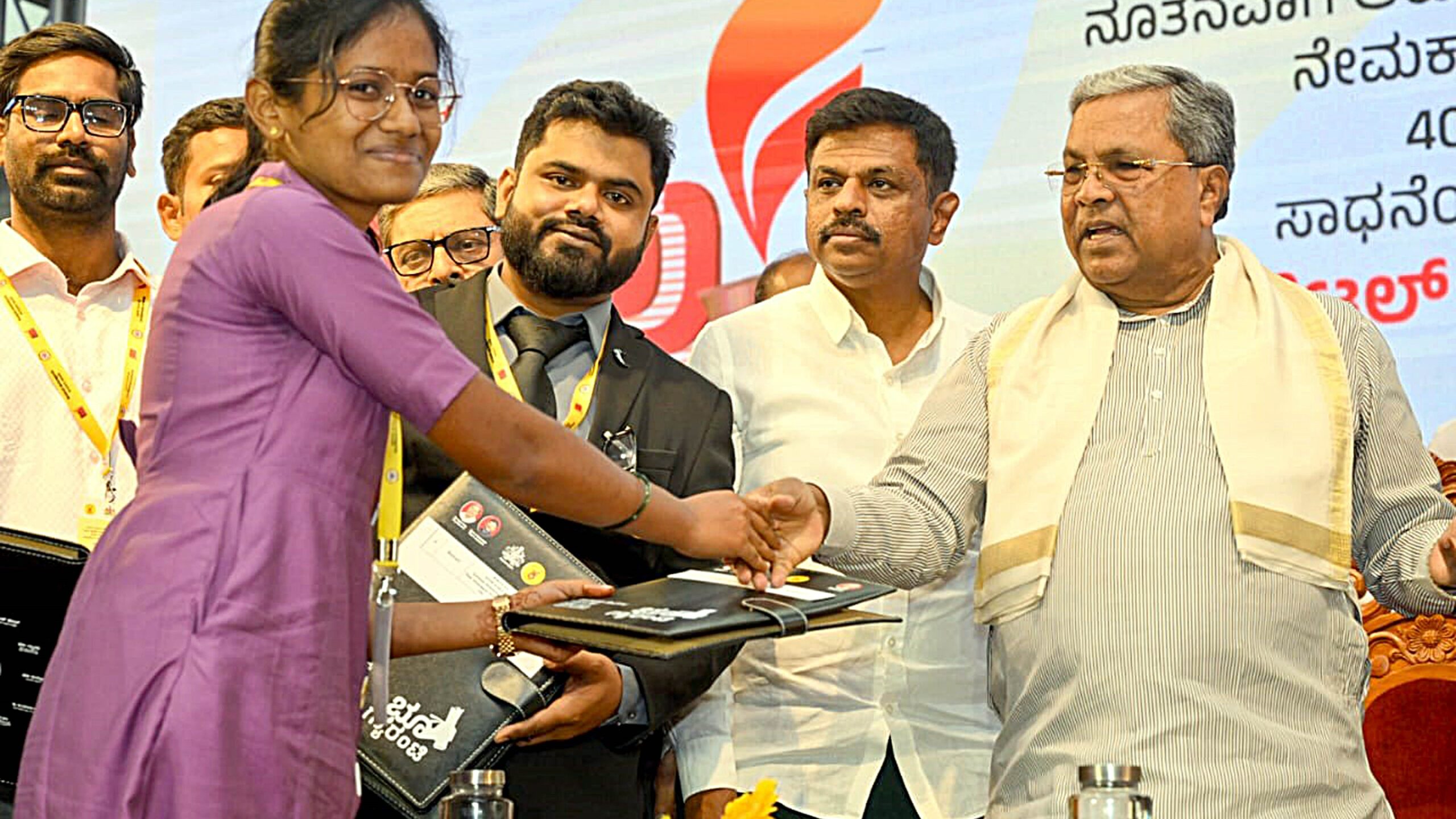 Chief Minister Siddaramaiah launching the grassroots governance programme and equipping the newly appointed VAOs.