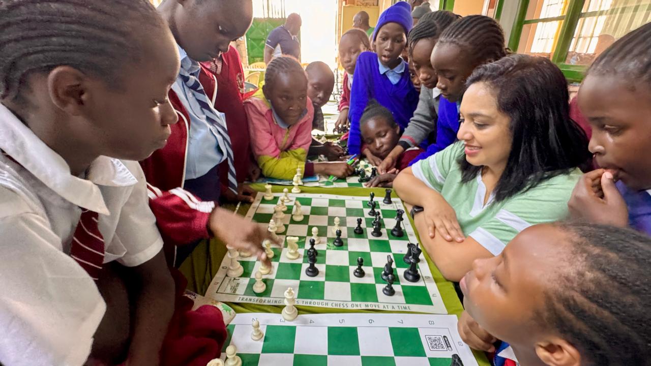 Kavya Mallana imparting chess skills to underprivileged children in India and Africa.