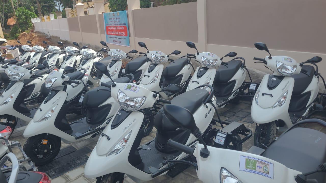 The scooters donated by MRPL and their recipients.