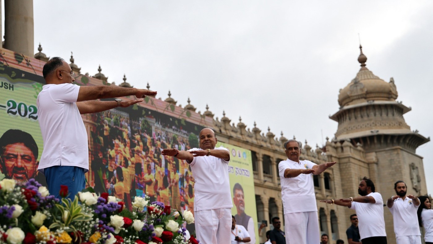 The Governor of Karnataka and senior political leaders participating in International Yoga Day 2025 celebrations at Vidhana Soudha in Bengaluru.