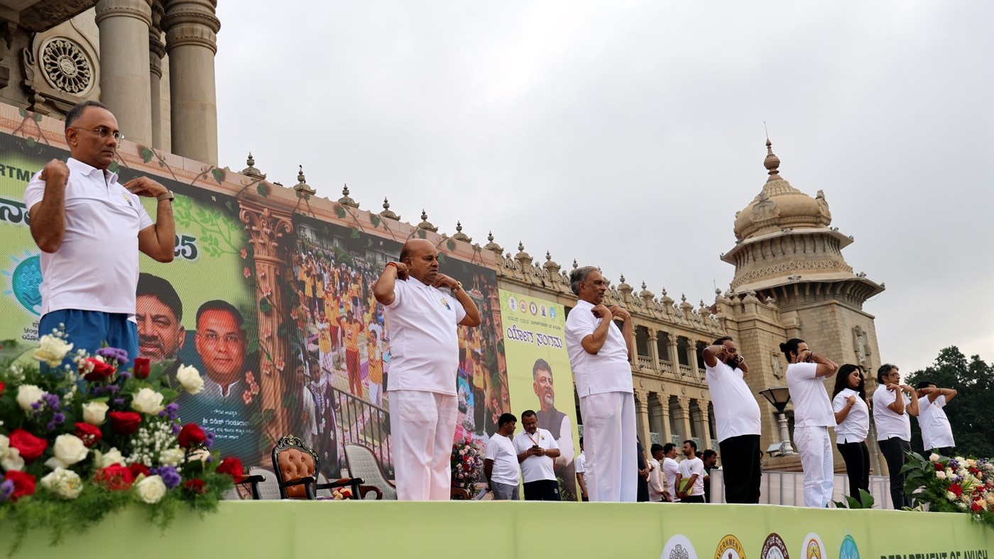 The Governor of Karnataka and senior political leaders participating in International Yoga Day 2025 celebrations at Vidhana Soudha in Bengaluru.