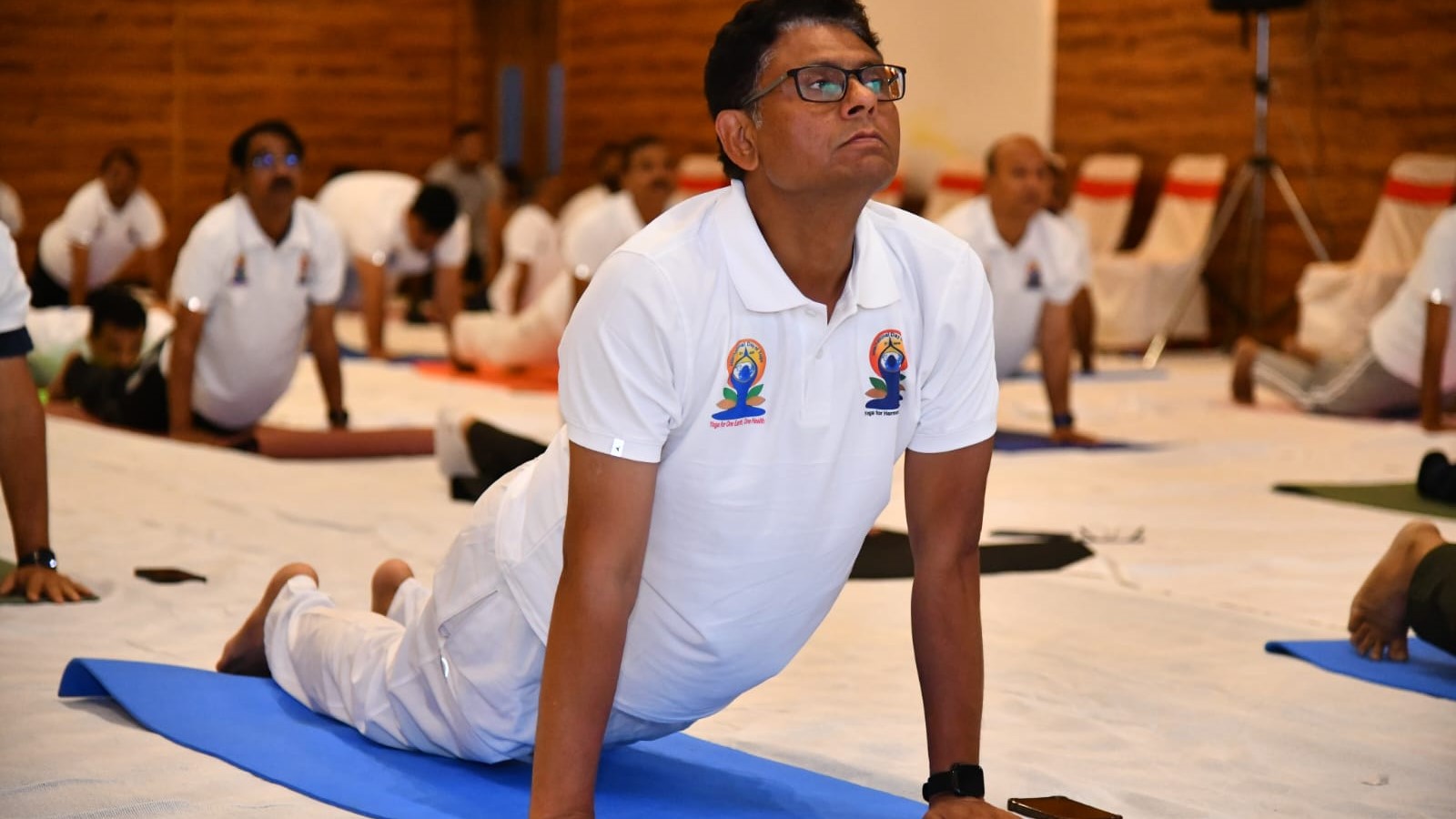 South Western Railway officials performing yogasanas on the occasion.