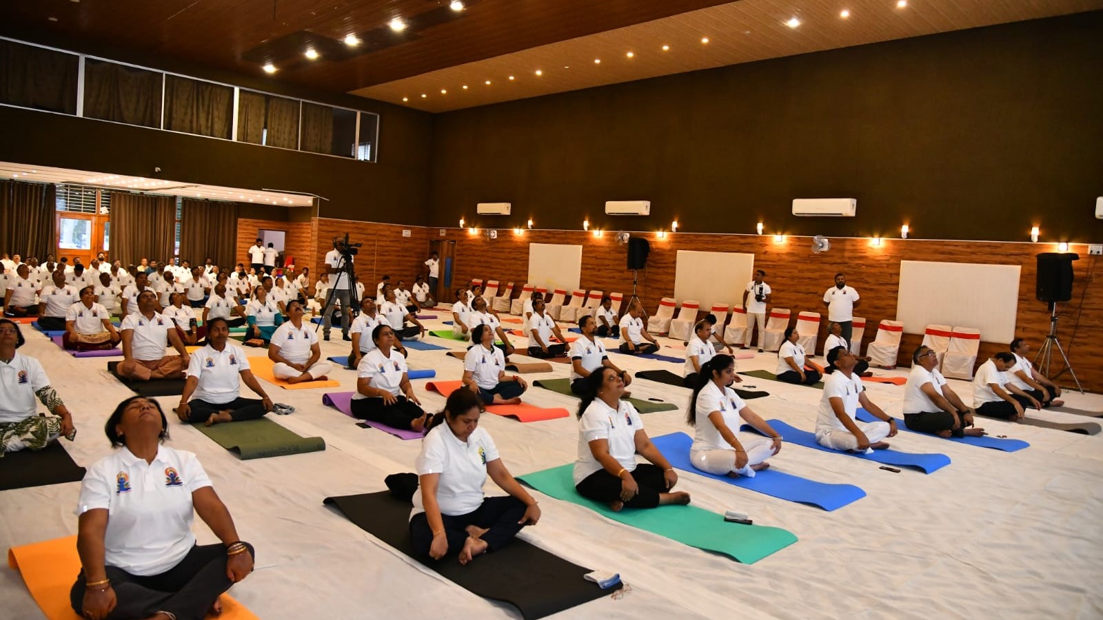 South Western Railway officials performing yogasanas on the occasion.
