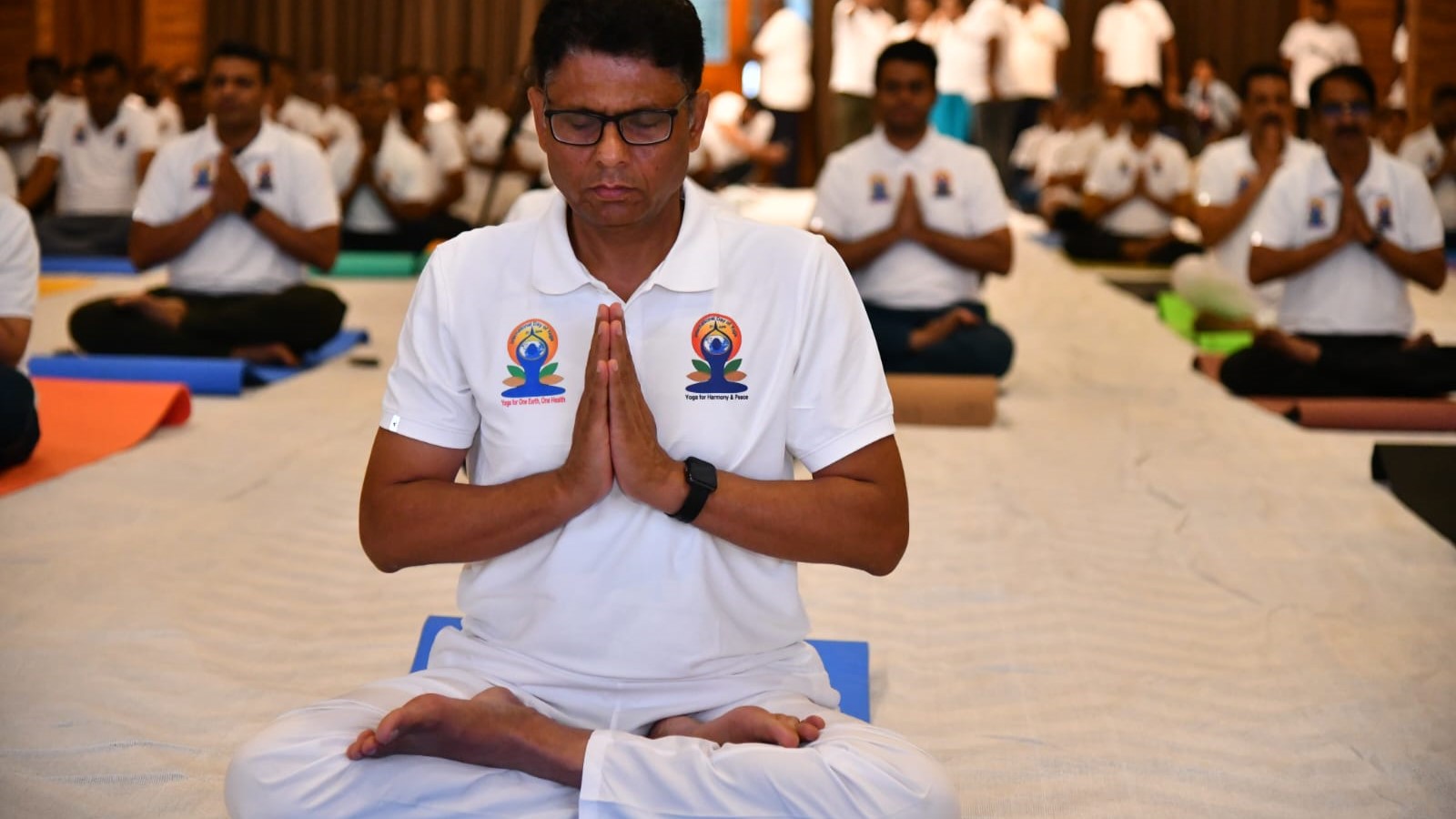 South Western Railway officials performing yogasanas on the occasion.