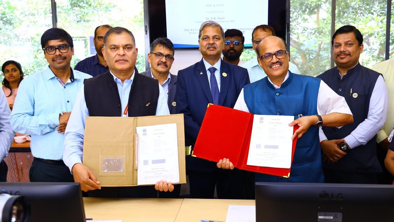 Officials of HAL and CeNS showing the MoU signed.