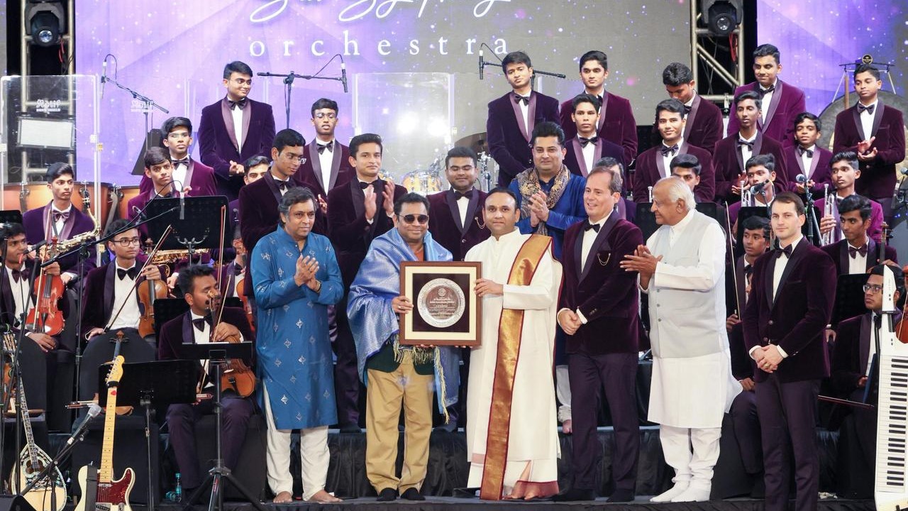 Musical legend AR Rahman along with the Sai Symphony Orchestra.