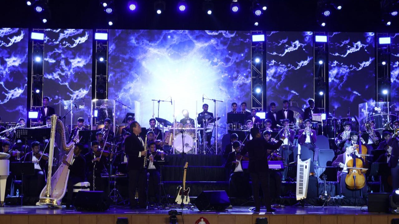 Musical legend AR Rahman along with the Sai Symphony Orchestra.