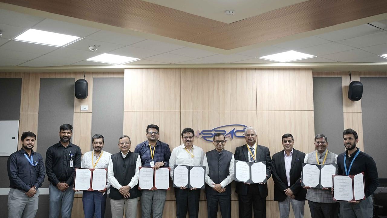 IN-SPACe officials and industry players displaying the signed technology transfer document.