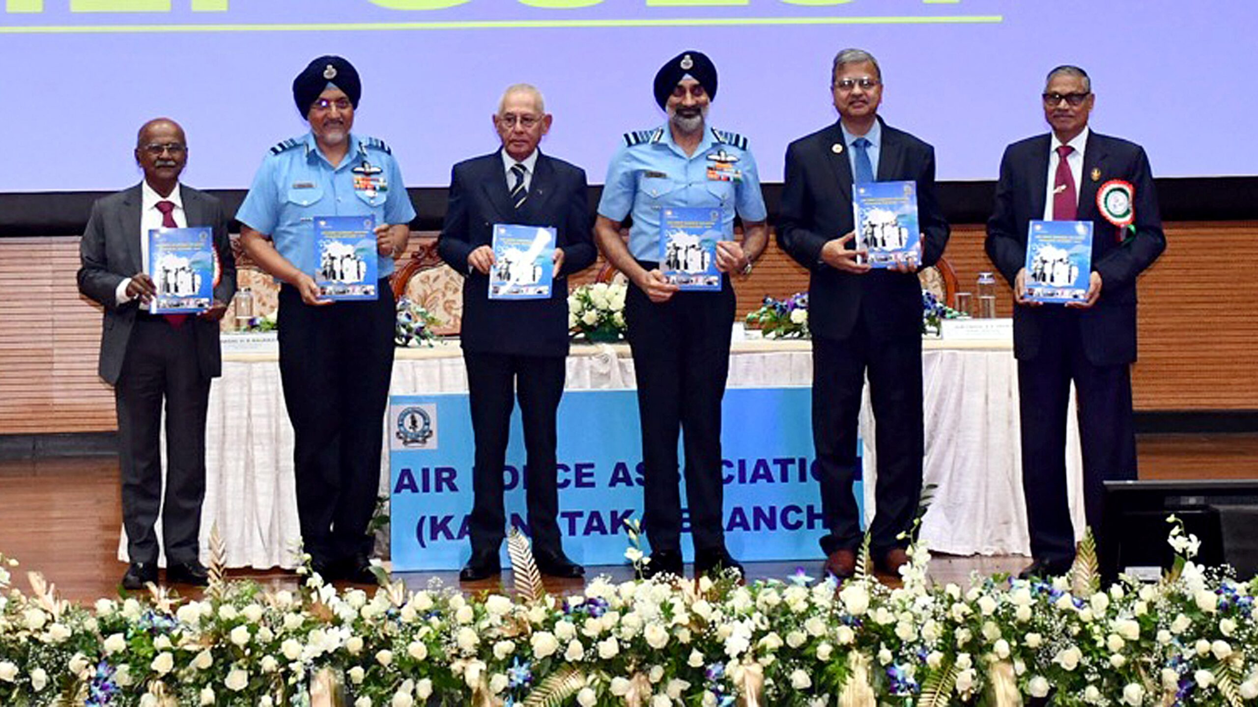 Distinguished IAF and HAL dignitaries at the memorial lecture on the legacy of the Indian Air Force.