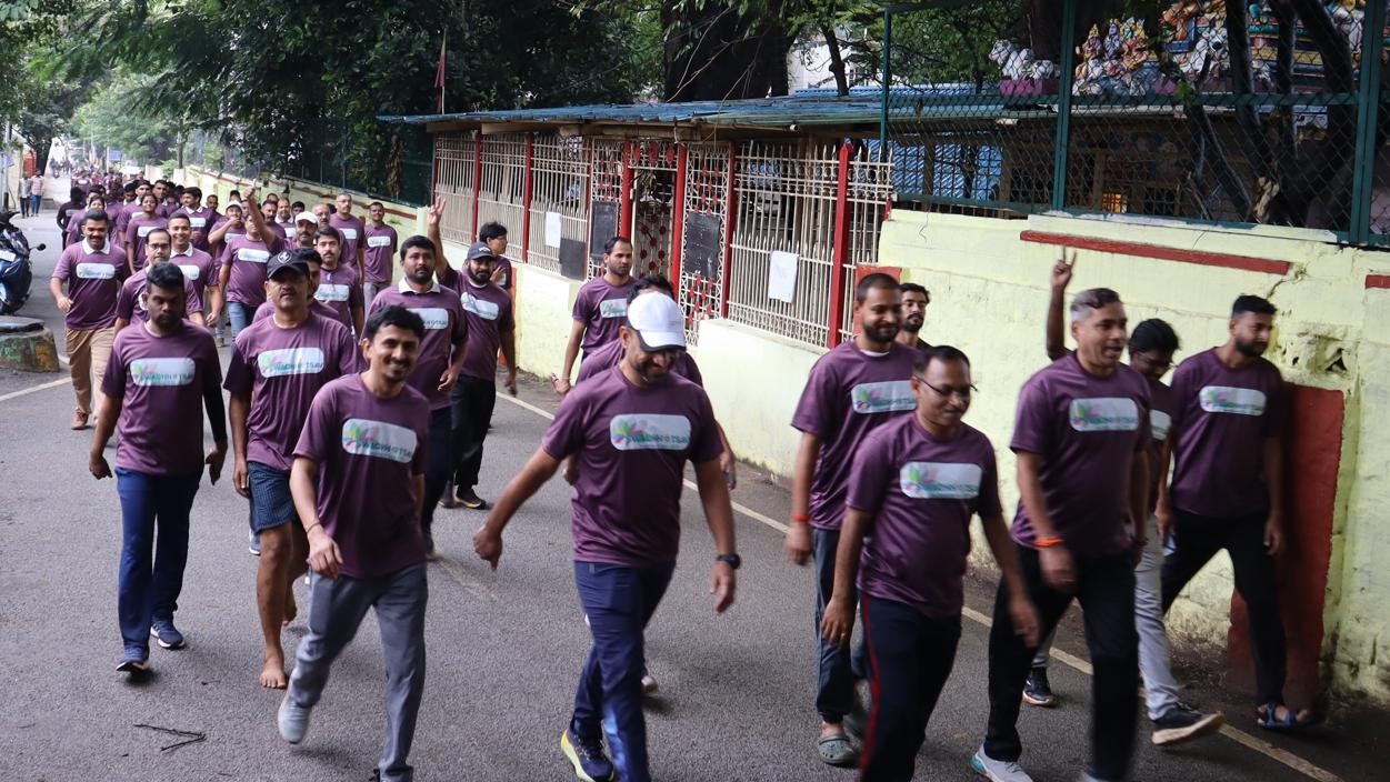 Railway employees during the walkathon for cleanliness in the city.