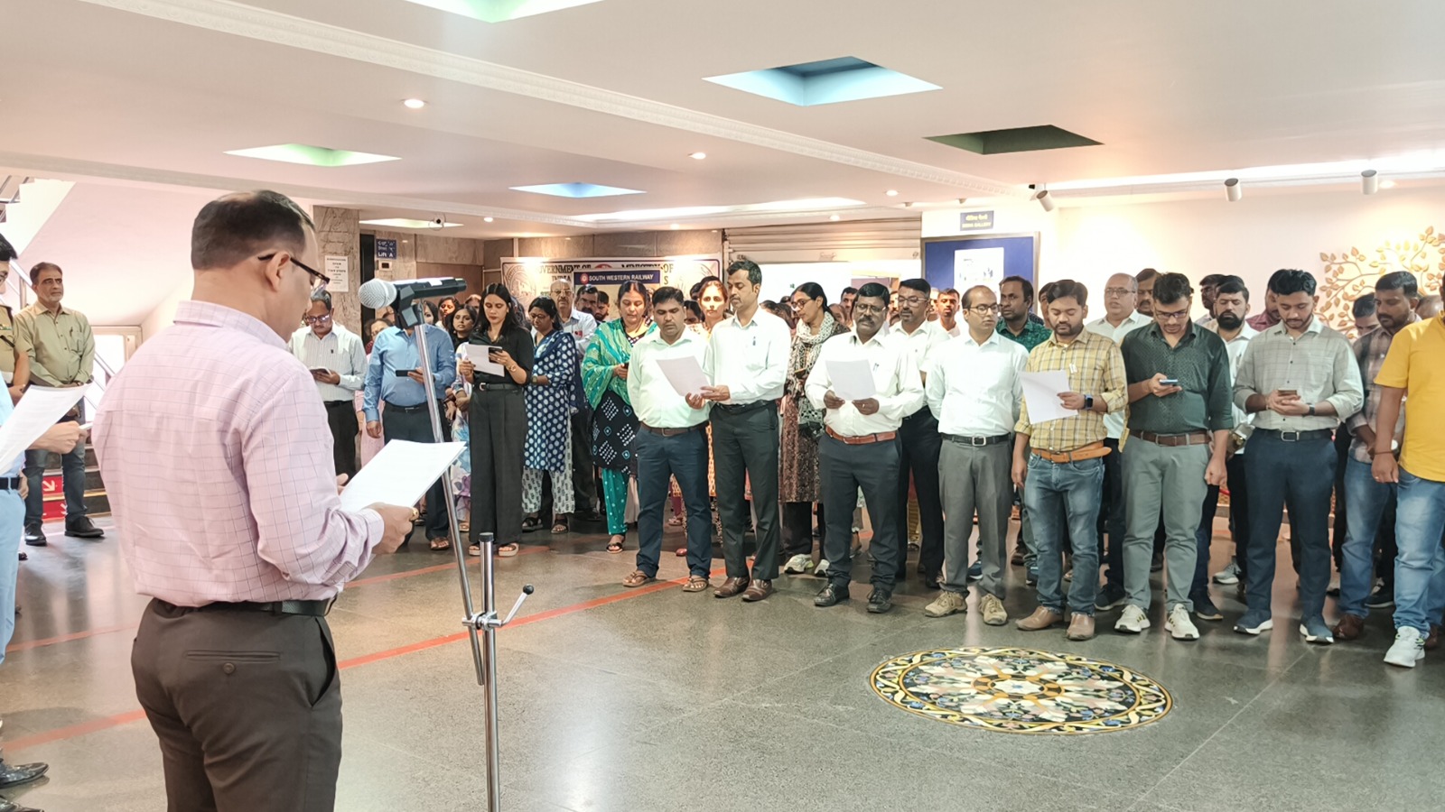 Railway officers observing Vigilance Awareness Week in Hubballi and Bengaluru.