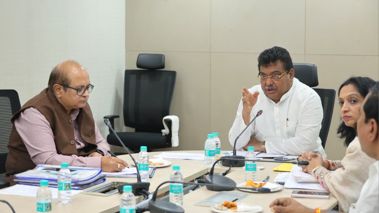 Karnataka Industries Minister MB Patil during a meeting on mobile technology business upgrades.