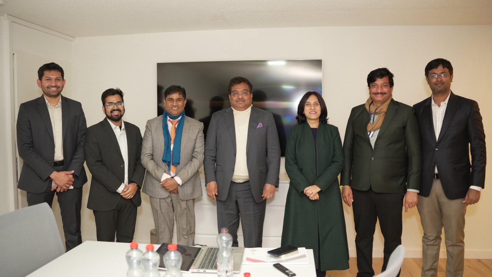 Karnataka Industries Minister M B Patil and officials in discussions with business leaders in Davos.