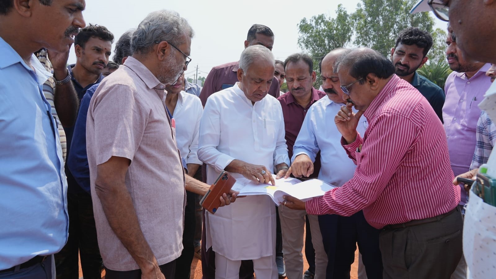 Science and Technology Minister NS Boseraju inspecting the land allotted for Q-City in Hesaraghatta.