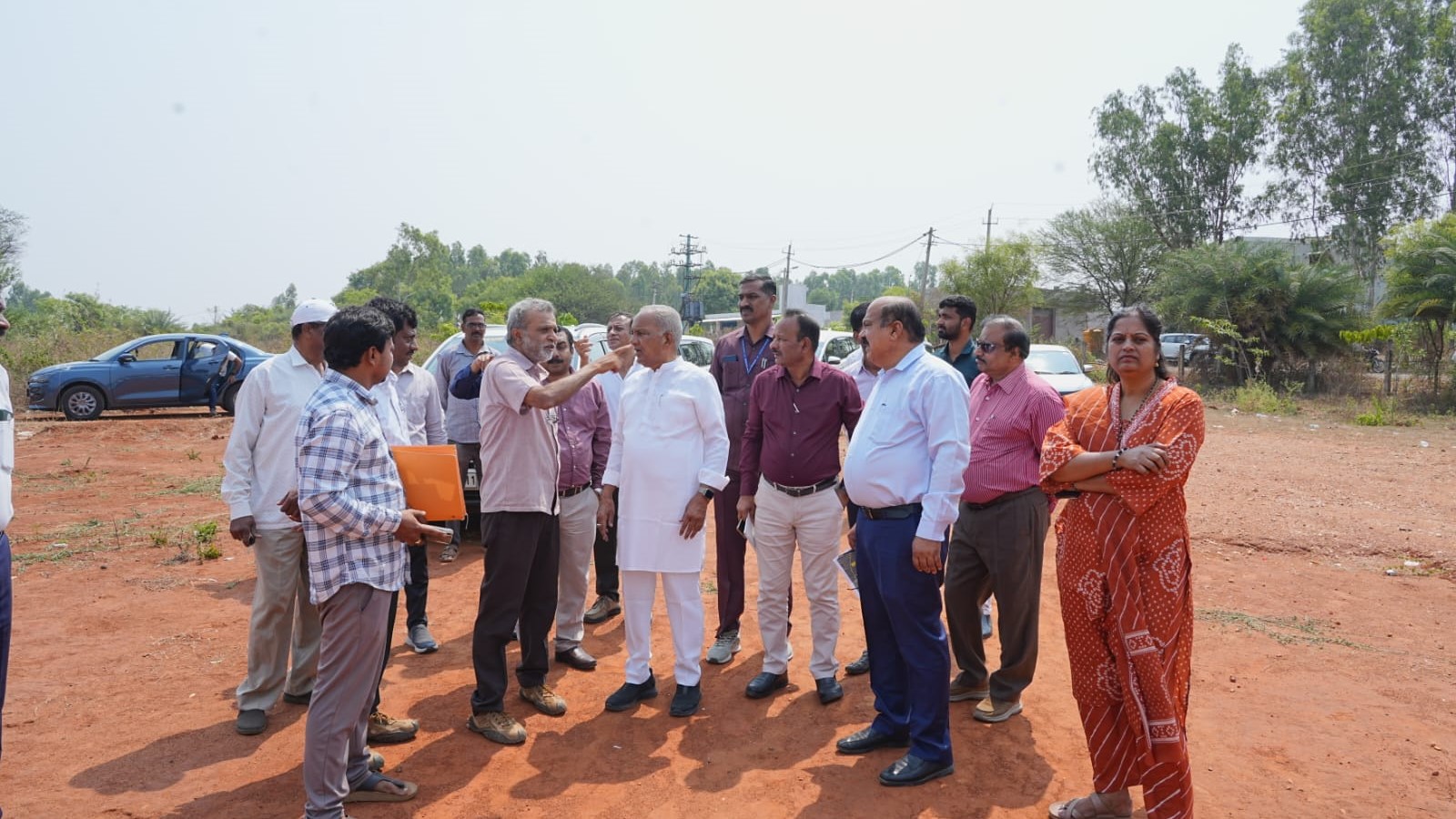 Science and Technology Minister NS Boseraju inspecting the land allotted for Q-City in Hesaraghatta.