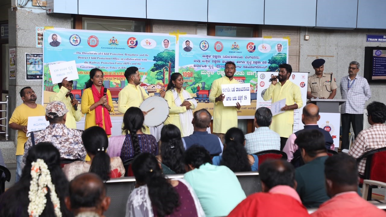 Officials and rail users during the awareness programme at KSR Bengaluru station.