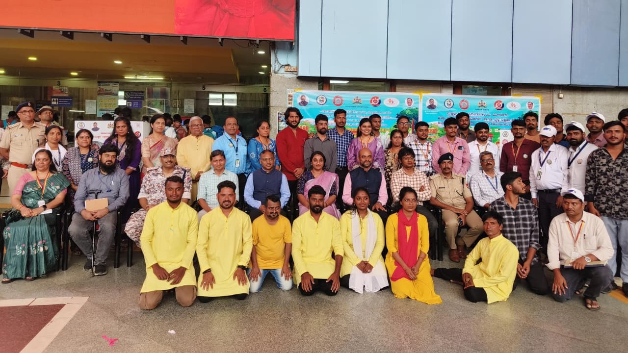Officials and rail users during the awareness programme at KSR Bengaluru station.