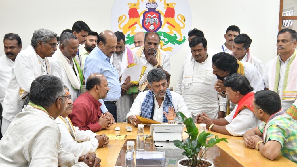 Karnataka Chief Minister DK Shivakumar interacting with property owners in Bengaluru.
